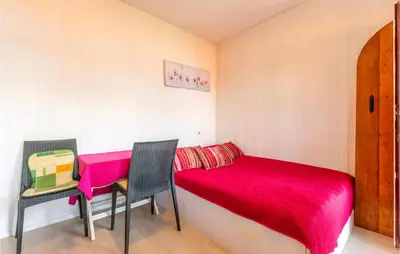 Krevet ili kreveti u jedinici u objektu Cozy Apartment In Lokva Rogoznica With Wifi