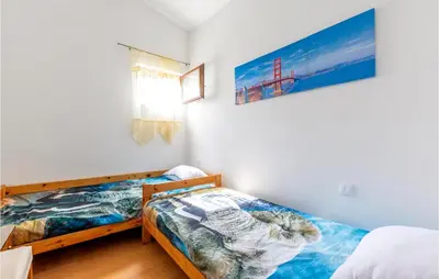 Krevet ili kreveti u jedinici u objektu 2 Bedroom Awesome Apartment In Lokva Rogoznica
