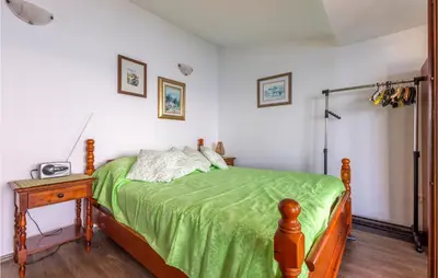 Krevet ili kreveti u jedinici u objektu 2 Bedroom Awesome Apartment In Lokva Rogoznica