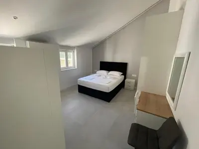 Krevet ili kreveti u jedinici u objektu New Modern Deluxe Apartmens Domo