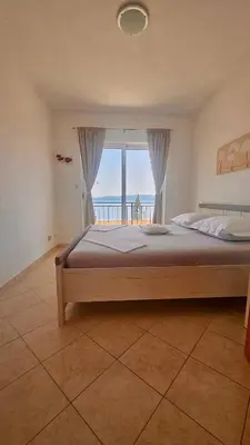 Krevet ili kreveti u jedinici u objektu Apartmani Vinka