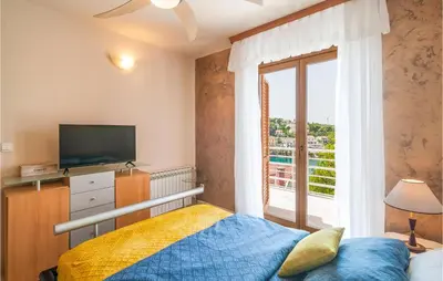 Krevet ili kreveti u jedinici u objektu Beautiful Home In Supetar