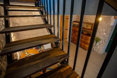 Krevet ili kreveti na kat u jedinici u objektu Charming stone house with private pool & jacuzzi - Holiday Home Vera