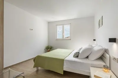 Krevet ili kreveti u jedinici u objektu Bona fide sea view apartments