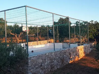 Tereni za tenis i/ili skvoš u sklopu objekta Holiday home Glavica ili u blizini