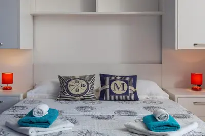 Krevet ili kreveti u jedinici u objektu J.B. Beachfront Suites
