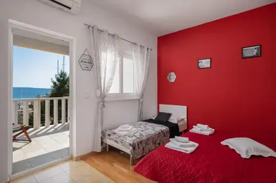 Krevet ili kreveti u jedinici u objektu J.B. Beachfront Suites