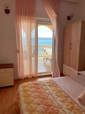 Krevet ili kreveti u jedinici u objektu Apartmani Lugonja***