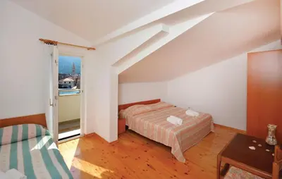 Krevet ili kreveti u jedinici u objektu Apartman Tudor