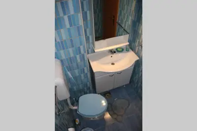 Kupaonica u objektu Room Šolo
