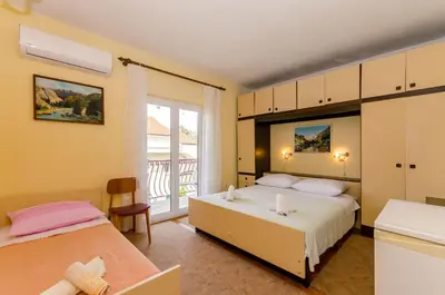 Krevet ili kreveti u jedinici u objektu Rooms Ante