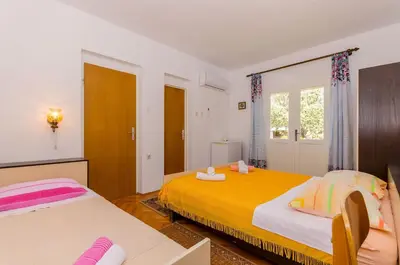 Krevet ili kreveti u jedinici u objektu Rooms Ante