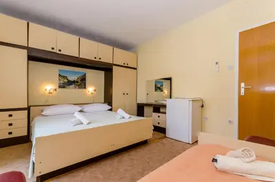 Krevet ili kreveti u jedinici u objektu Rooms Ante