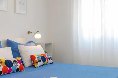 Krevet ili kreveti u jedinici u objektu Two Flowers Luxury Apartment