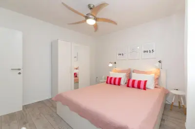 Krevet ili kreveti u jedinici u objektu Two Flowers Luxury Apartment