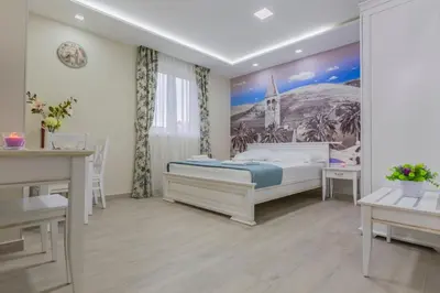 Krevet ili kreveti u jedinici u objektu Villa Rita Apartments II