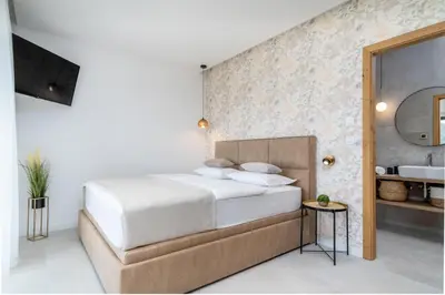 Krevet ili kreveti u jedinici u objektu Villa Top Hill, heated infinity pool, Jacuzzi, Sauna, 5 en-suite bedrooms, a Media room