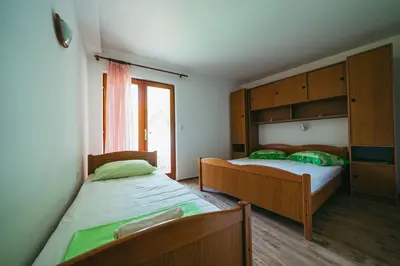 Krevet ili kreveti u jedinici u objektu Apartments Lovre