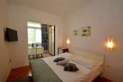 TV i/ili zabavni centar u objektu Apartment in Duce with sea view, terrace, air conditioning, WiFi 4969-2
