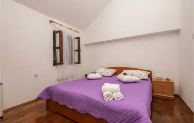 Krevet ili kreveti u jedinici u objektu 2 Bedroom Gorgeous Home In Baska Voda