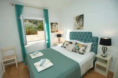 Krevet ili kreveti u jedinici u objektu IDIS Holiday Home