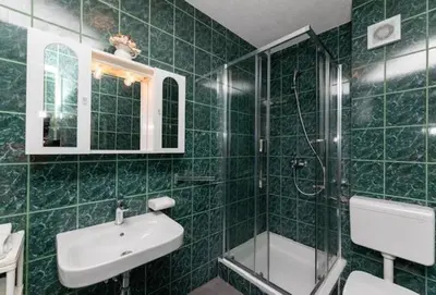 Kupaonica u objektu Apartment in Supetar with sea view, terrace, air conditioning, W-LAN 3553-1