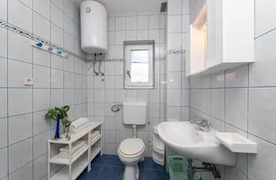 Kupaonica u objektu Apartment in Supetar with sea view, balcony, air conditioning, W-LAN 3553-2