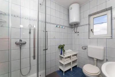 Kupaonica u objektu Apartment in Supetar with sea view, balcony, air conditioning, W-LAN 3553-2