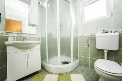 Kupaonica u objektu Apartment in Povlja with sea view, balcony, air conditioning WiFi 4936-1 -2 -3
