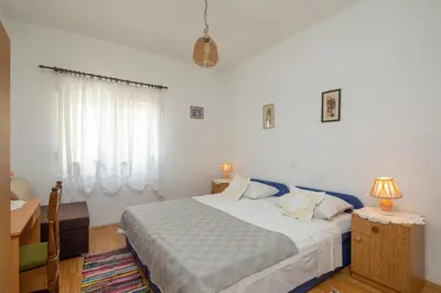 Krevet ili kreveti u jedinici u objektu A2 apt near beach w patio parking and grill