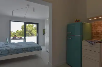 Krevet ili kreveti u jedinici u objektu Lazaneo Seafront Apartments, Jelsa Hvar