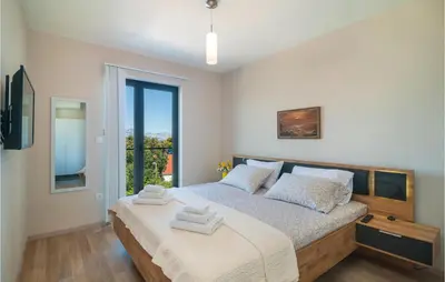 Krevet ili kreveti u jedinici u objektu Gorgeous Apartment In Selca With House Sea View