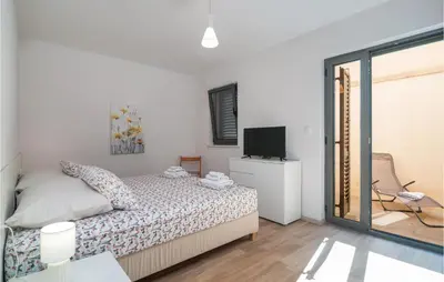 Krevet ili kreveti u jedinici u objektu 1 Bedroom Nice Apartment In Selca