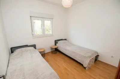 Krevet ili kreveti u jedinici u objektu Comfort City Center Apartment