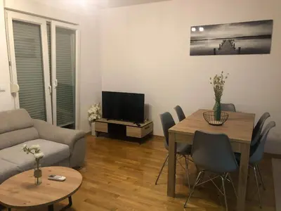 TV i/ili zabavni centar u objektu Comfort Sea View Apartment