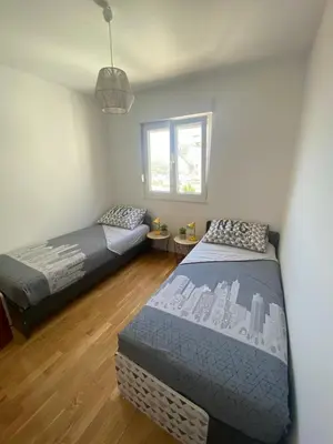 Krevet ili kreveti u jedinici u objektu Comfort Sea View Apartment