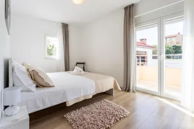 Krevet ili kreveti u jedinici u objektu Villa Ana perfect for families with kids and groups,House with heated Pool