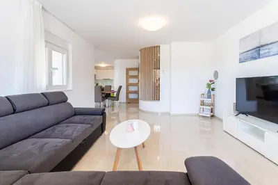 TV i/ili zabavni centar u objektu Villa Ana perfect for families with kids and groups,House with heated Pool