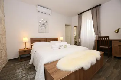 Krevet ili kreveti u jedinici u objektu Villa Sion peaceful villa with private pool and stunning mountain view