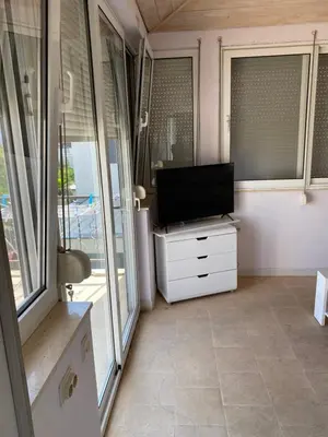 TV i/ili zabavni centar u objektu Apartments Sonya Garden BBQ Supetar