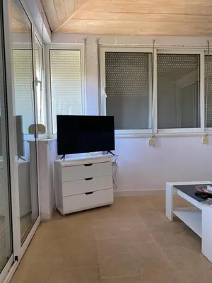 TV i/ili zabavni centar u objektu Apartments Sonya Garden BBQ Supetar