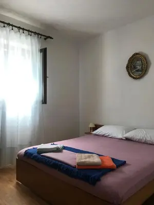 Krevet ili kreveti u jedinici u objektu Apartments Sonya Garden BBQ Supetar