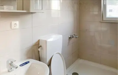 Kupaonica u objektu 2 Bedroom Cozy Apartment In Supetar-Splitska