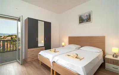 Krevet ili kreveti u jedinici u objektu Stunning Apartment In Supetar-Splitska With Wifi