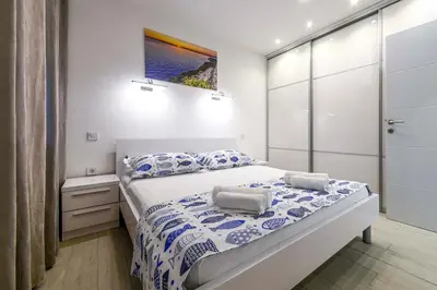 Krevet ili kreveti u jedinici u objektu Beach Makarska Apartment