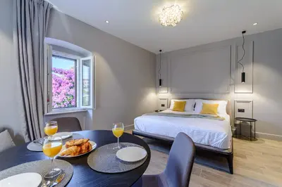 Krevet ili kreveti u jedinici u objektu Dora rooms and studios
