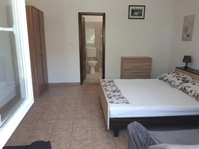 Krevet ili kreveti u jedinici u objektu Anic Apartments Stanići