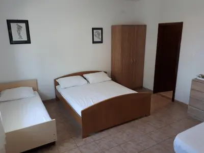 Krevet ili kreveti u jedinici u objektu Anic Apartments Stanići
