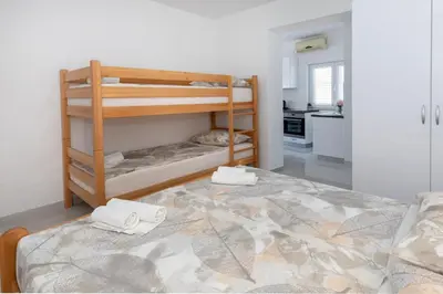 Krevet ili kreveti u jedinici u objektu Villa Ševo Baška Voda