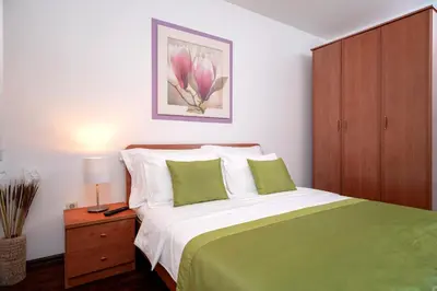 Krevet ili kreveti u jedinici u objektu Hektorovic poolside apartments